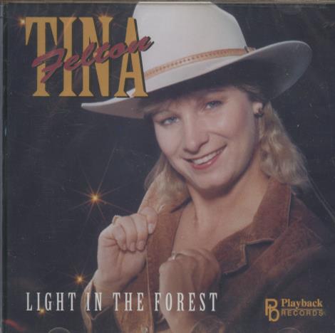 Tina Felton: Light In The Forest w/ Cracked Case
