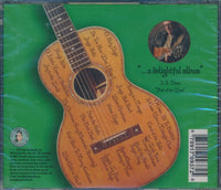 Paul Johnson: Christmas Guitars w/ Cracked Case