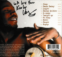 Kinobe: Leaving The Song Behind w/ Autographed Artwork